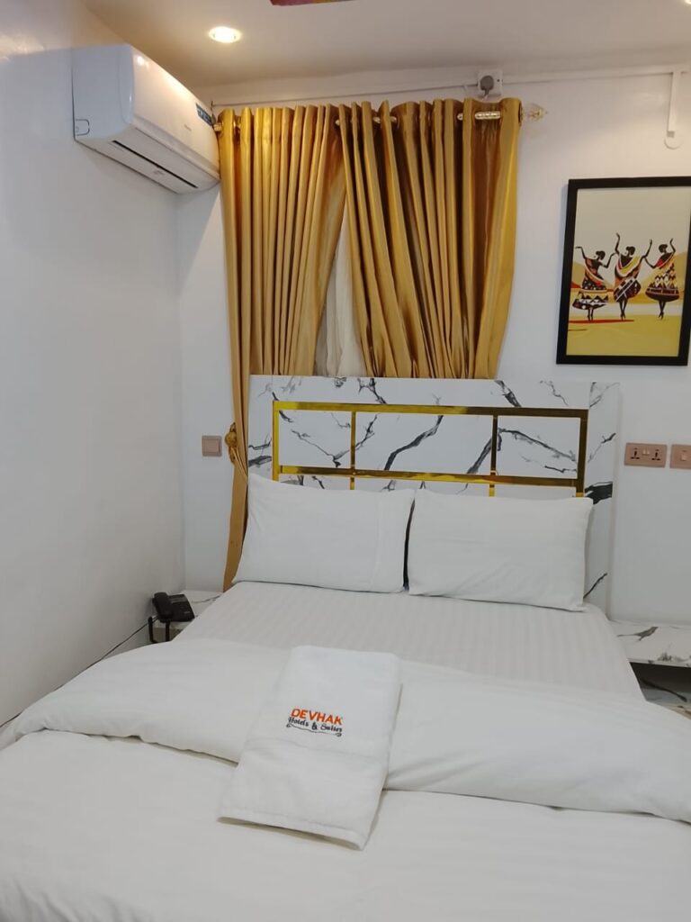 devhak hotel kaduna classic bed area